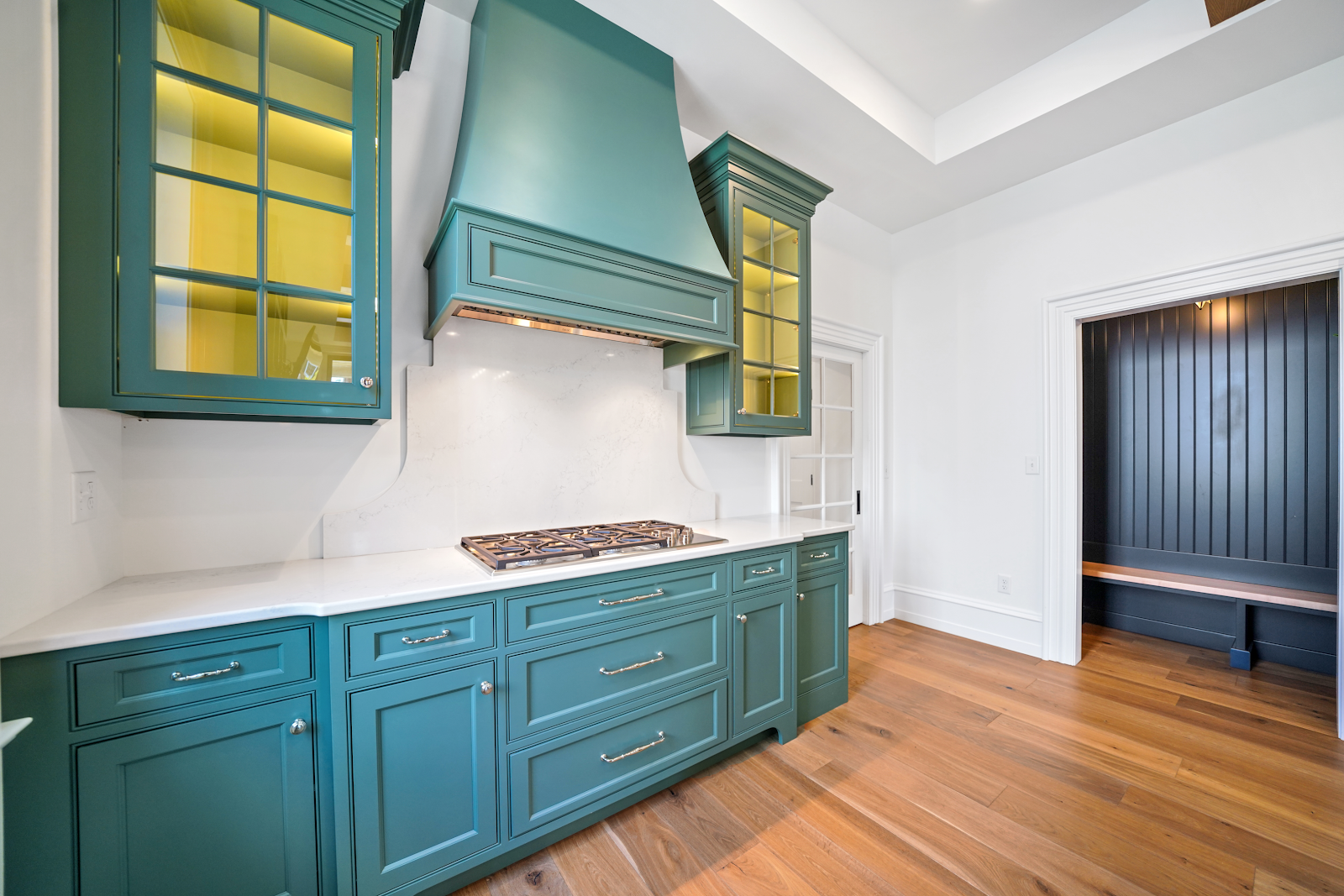 A colorful kitchen stove from a kitchen remodel at the Windle Design & Construction office 