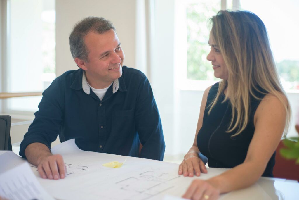 Image of a man and woman planning their home layout