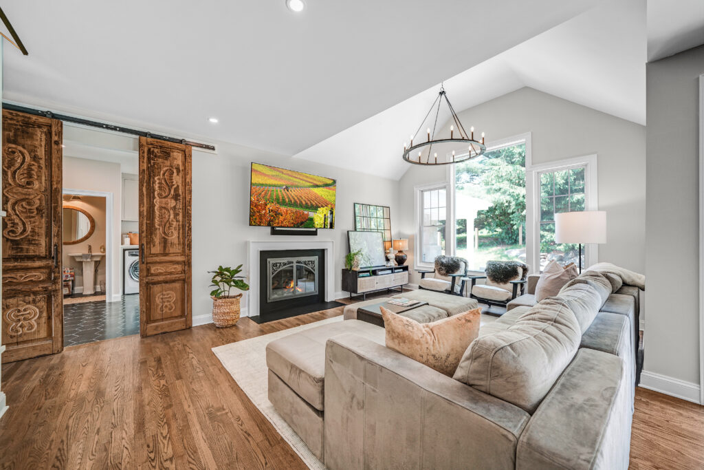 well lit room with luxury windows that bring in natural light