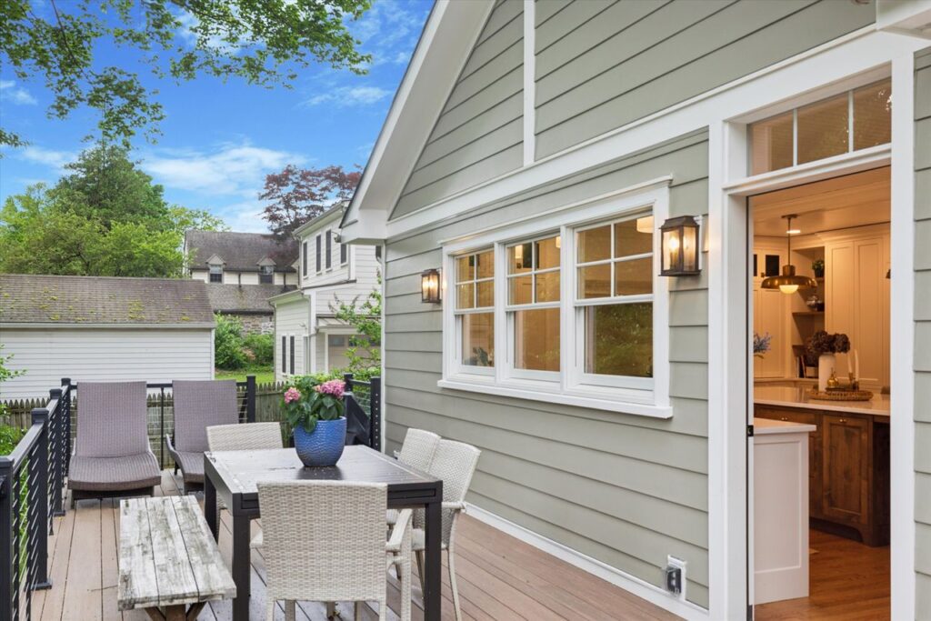 A home addition by Windle Design featuring a porch