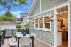 A home addition by Windle Design featuring a porch