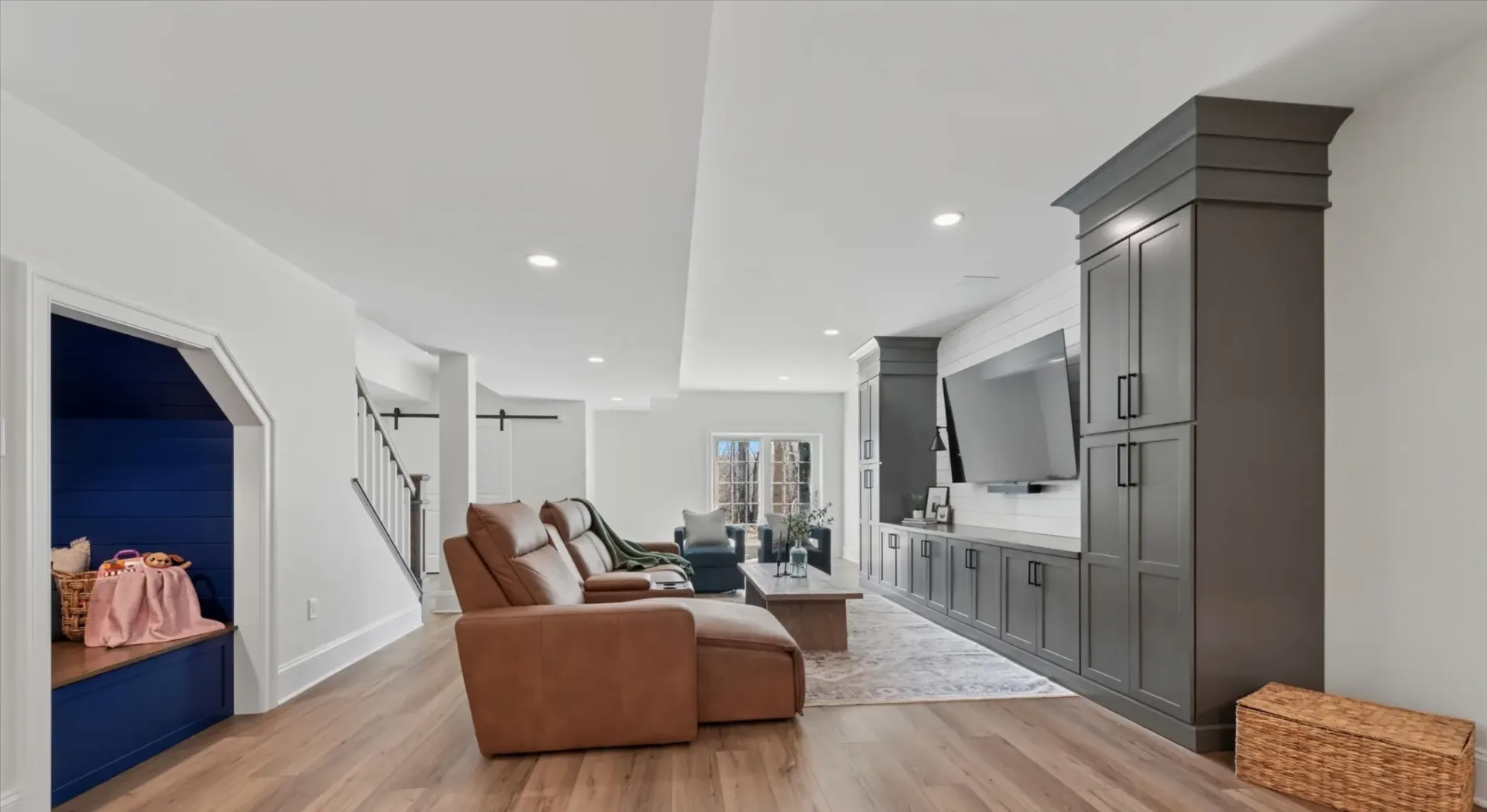A custom basement living space remodeled by Windle